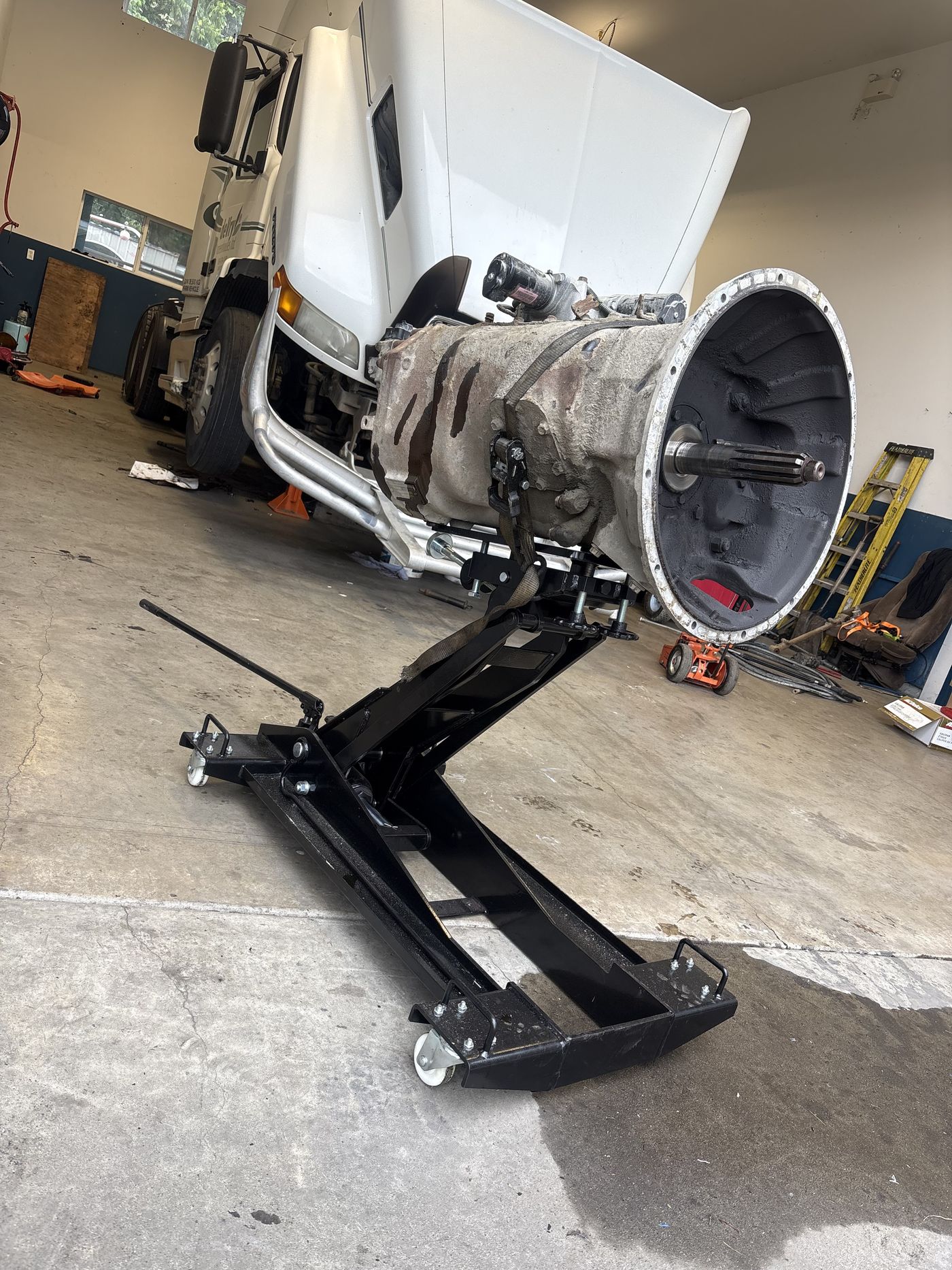 Transmission and torque converter housing pulled during an engine teardown at Mazdock Mechanical shop, Agassiz BC